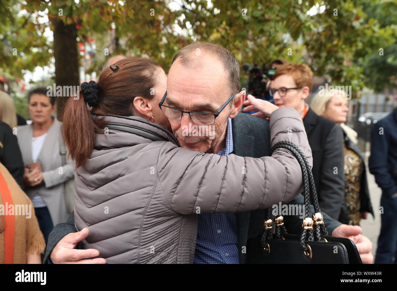 Liam Wray whose brother Jim was killed on Bloody Sunday, is hugged by another member of the Bloody Sunday families before walking to Londonderry Magistrates' Court, as the prosecution of a former soldier accused of two murders on Bloody Sunday will reach a courtroom for the first time. PA Photo. Picture date: Wednesday September 18, 2019. The case of Soldier F, who also faces five attempted murder charges in relation to the shootings in Londonderry on January 30 1972, has been listed for hearing before a district judge in Derry Magistrates' Court. See PA story ULSTER Sunday. Photo credit Stock Photo
