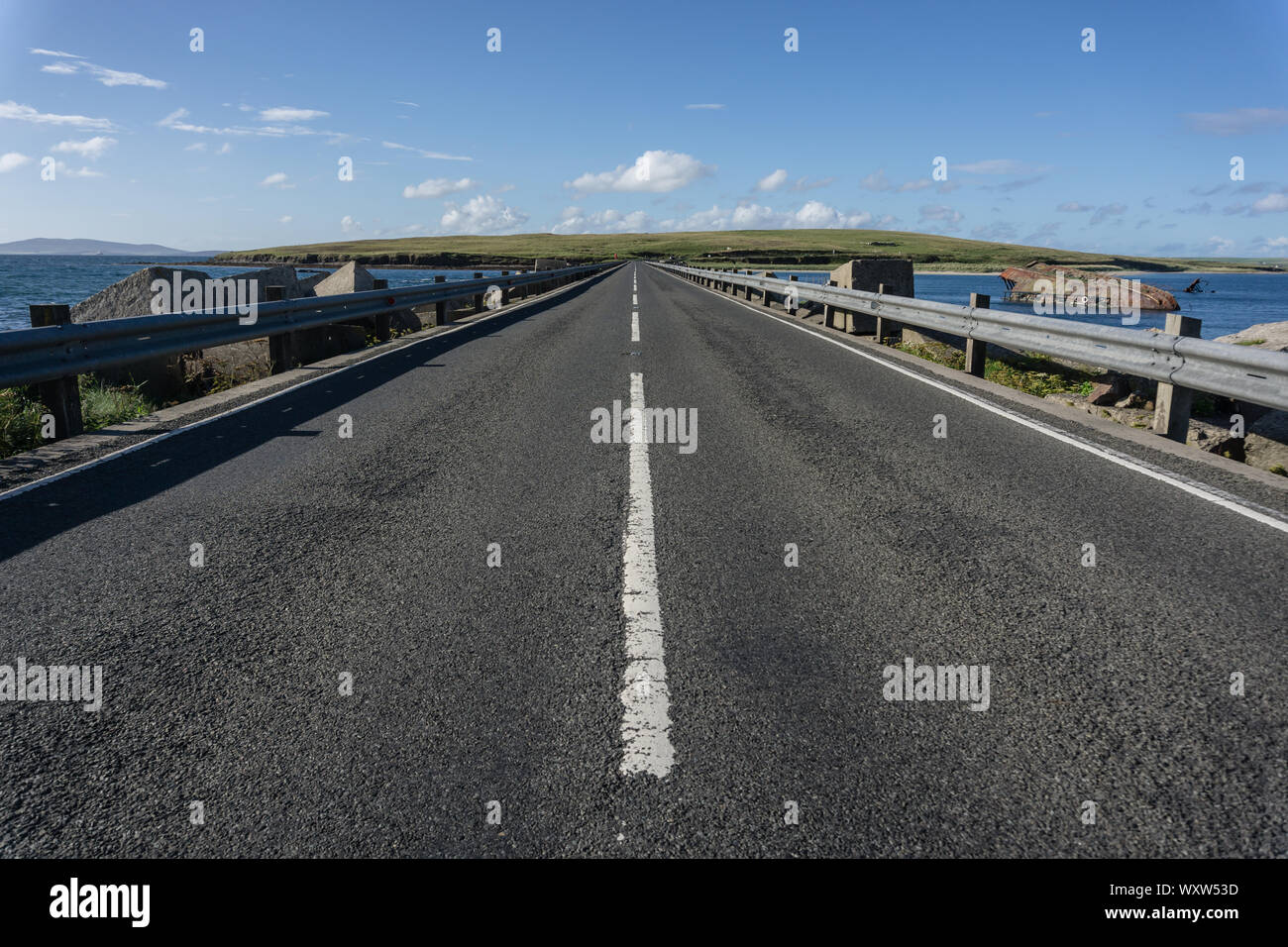 View of the road across the Churchill Barrier 3, Scapa Flow, Orkney, Scotland Stock Photo