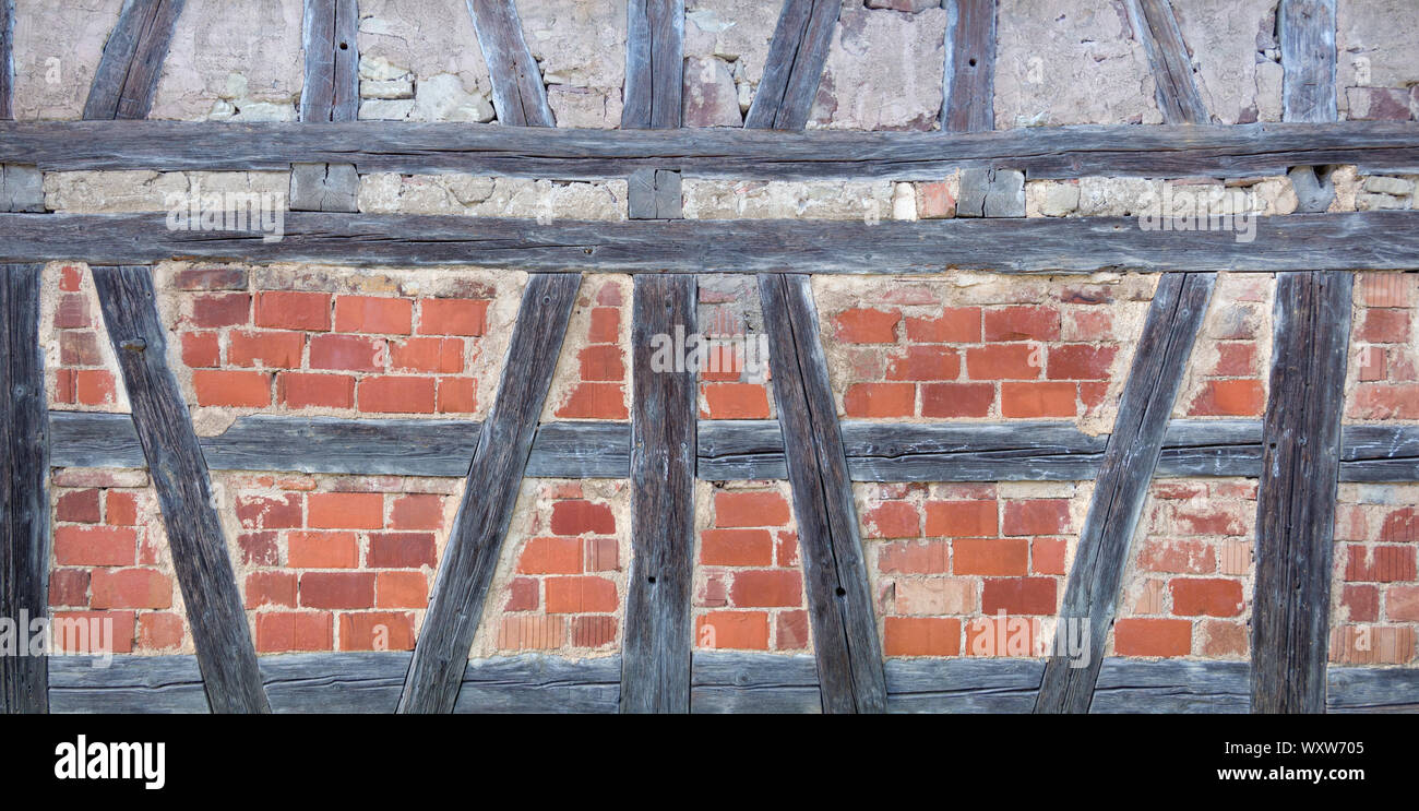Old half-timbered with red bricks Stock Photo