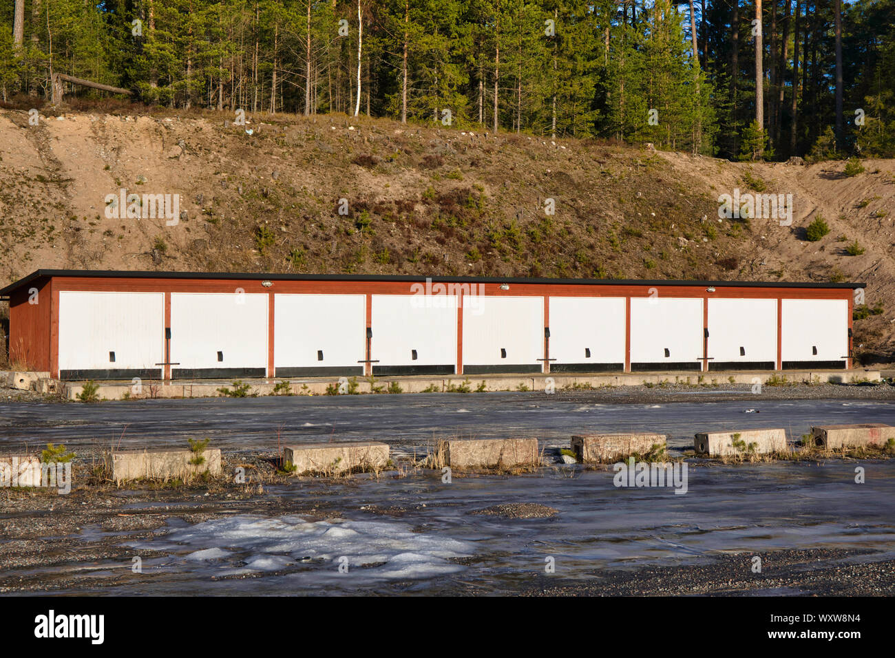 Line of garages in winter, Sweden, Scandinavia Stock Photo