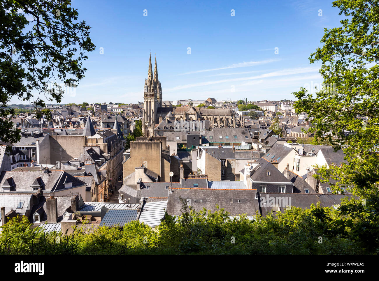 Quimper (Brittany, north-western France): the city centre viewed from the Park of Mont Frugy. Roofs of houses in the city centre and spires of the Cat Stock Photo