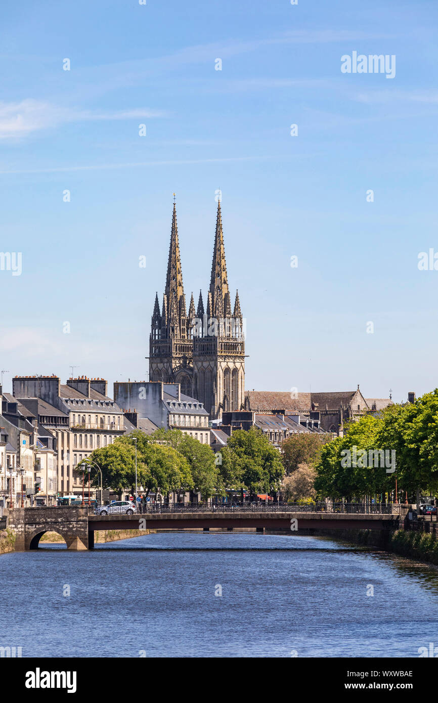 Quimper (Brittany, north-western France): overview of the town centre from the Odet river. The Odet river, the city centre and spires of the Cathedral Stock Photo