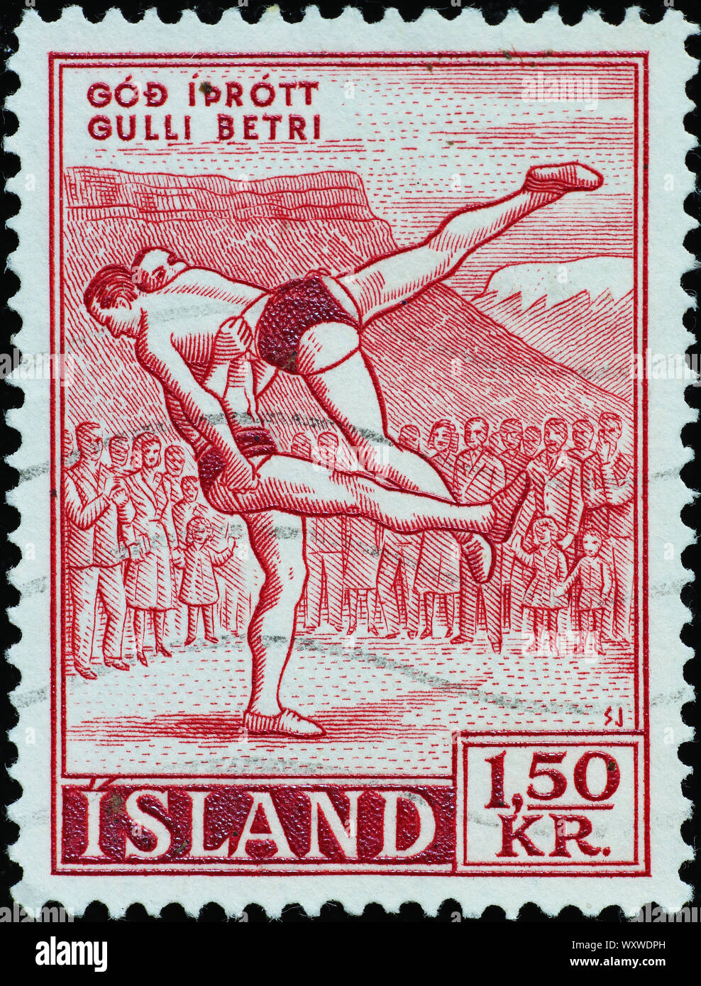 Couple of wrestlers on ancient icelandic postage stamp Stock Photo