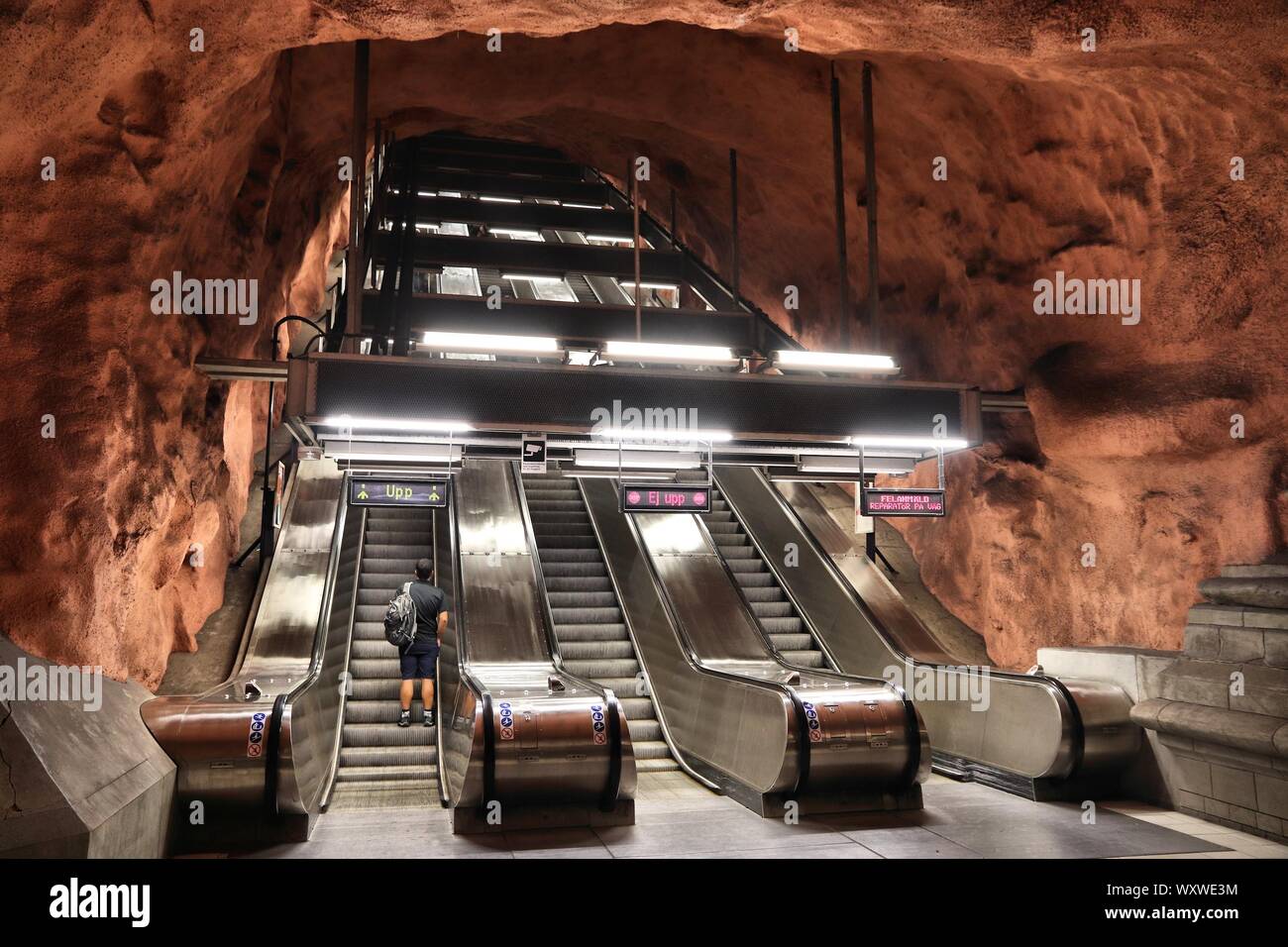 Bedrag plast Bliv oppe STOCKHOLM, SWEDEN - AUGUST 24, 2018: Person rides escalator in Stockholm  metro (T-bana) underground station in Sweden. Stockholm metro is known for  it Stock Photo - Alamy