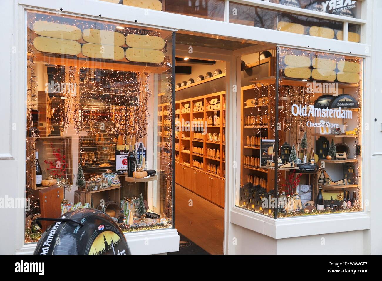 AMSTERDAM, NETHERLANDS - DECEMBER 6, 2018: Cheese store entrance in Amsterdam. Netherlands is famous for its multiple hard cheese varieties including Stock Photo