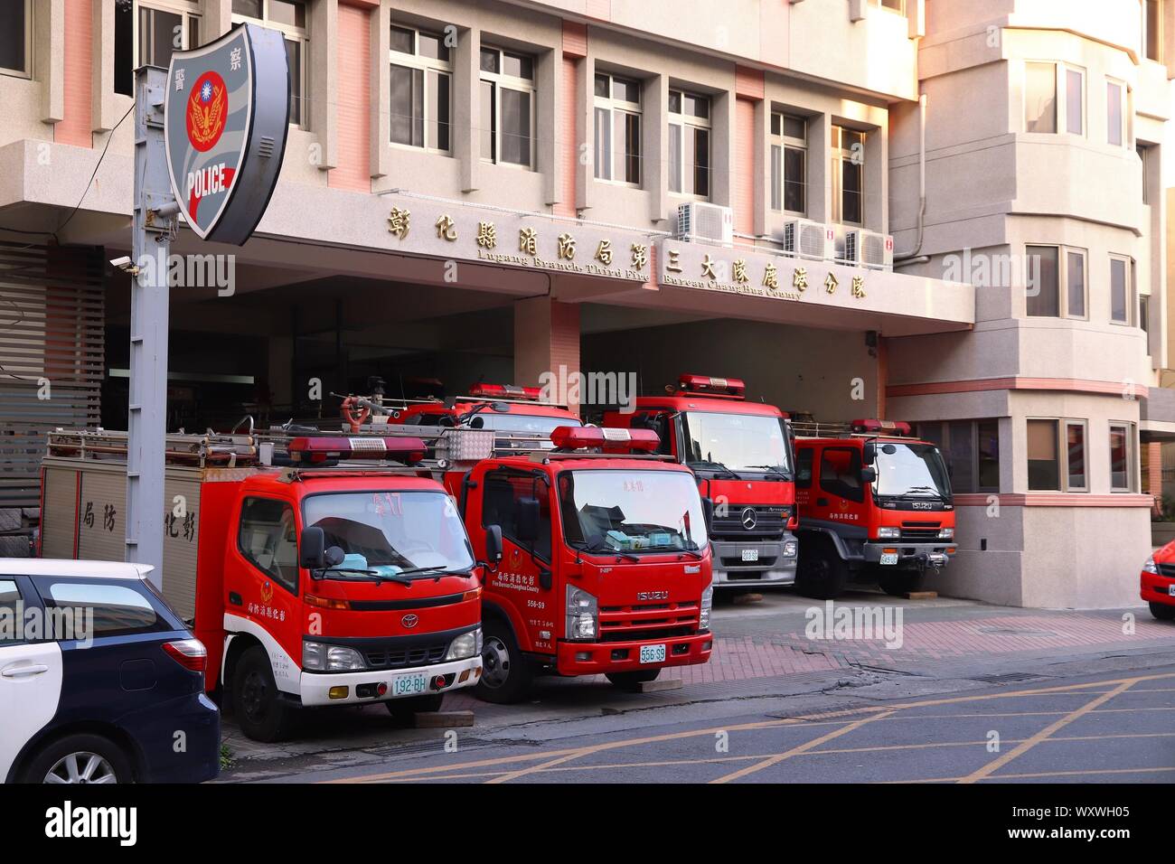 LUKANG, TAIWAN - DECEMBER 2, 2018: Fire station in Lukang, Taiwan. Isuzu and Toyota trucks. Stock Photo