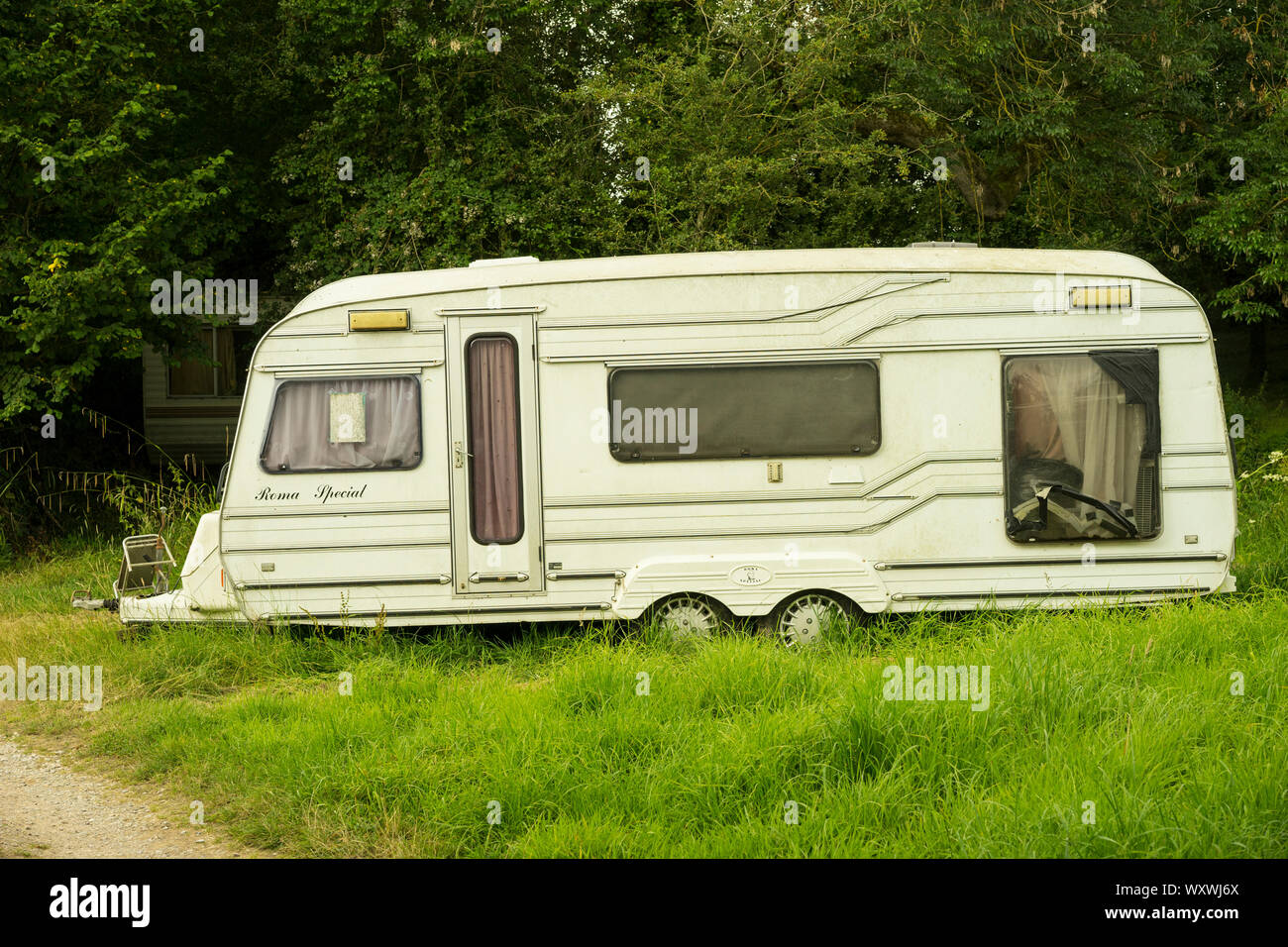 Old Travelers type caravan parked on land in Somerset, England, UK. Stock Photo