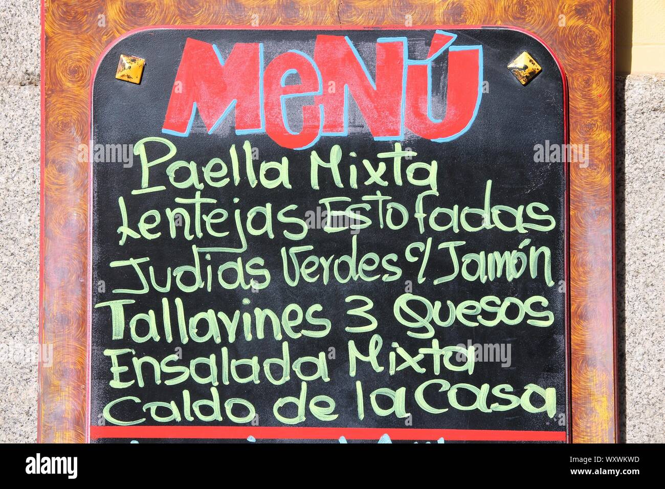 Restaurant menu with typical Spanish food - outdoor bar in Madrid ...