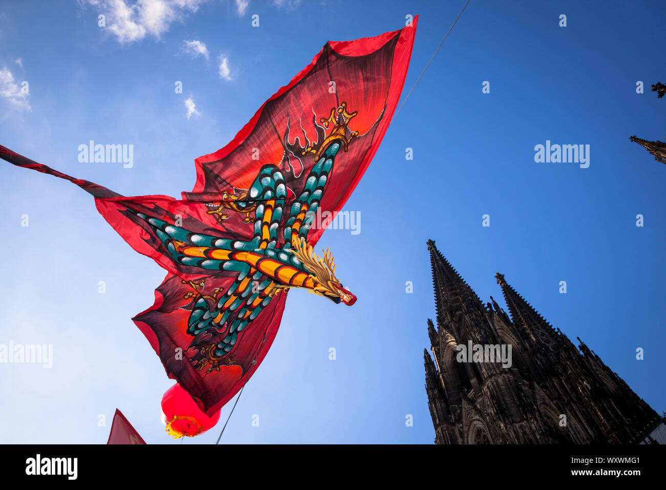 China festival on Roncalli square at the cathedral, dragon as decoration, Cologne, Germany.  Chinafest auf dem Roncalliplatz am Dom, Drache als Dekora Stock Photo