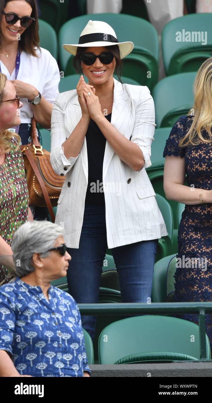 Meghan, Duchess of Sussex attends day 4 of the Wimbledon Tennis Championships at the All England Lawn Tennis and Croquet Club on July 04, 2019 in London, England. Stock Photo