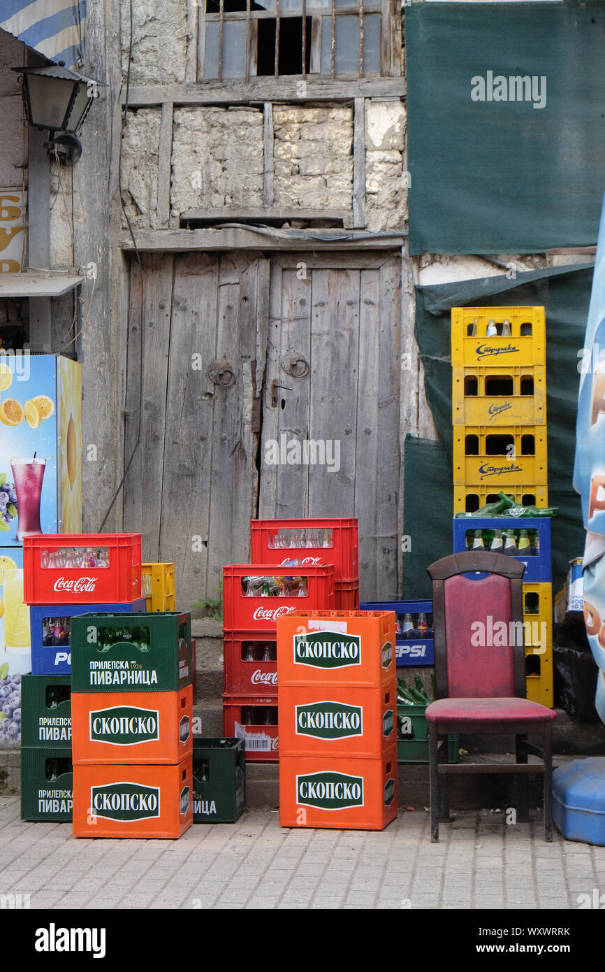 Empty beer and soft drink crates outside a bar in Ohrid, Macedonia Stock Photo