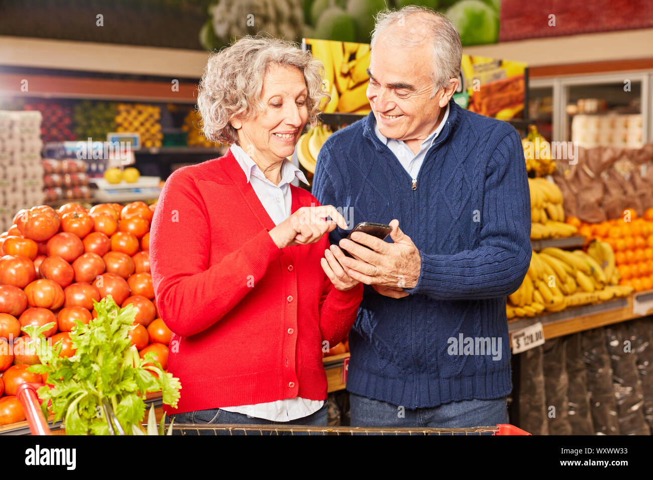 Seniors with smartphone app for information about food and price