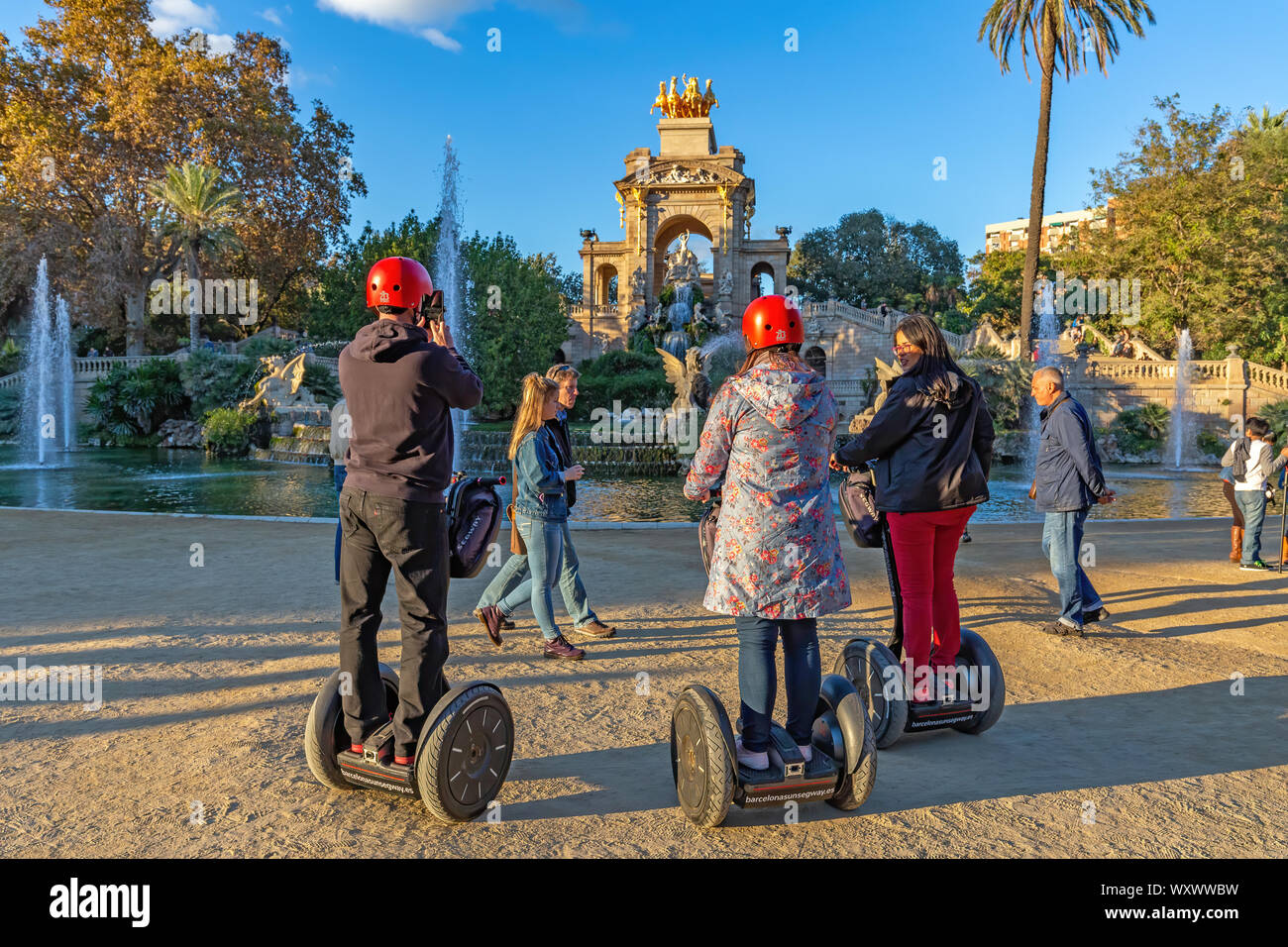 People make sightseeing with modern electric segway vehicle in Barcelona of Spain. 11. 06. 2016 Spain Stock Photo