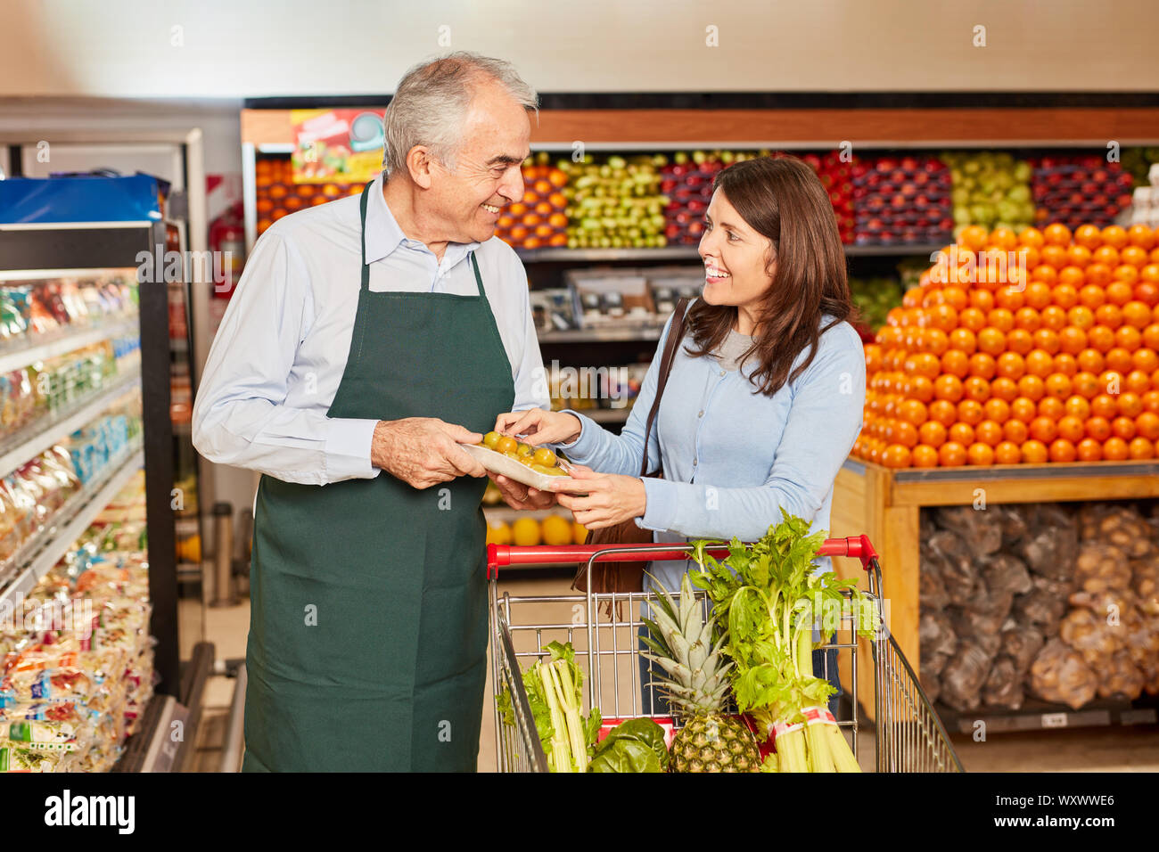 Grocery shopping apron hires stock photography and images Alamy
