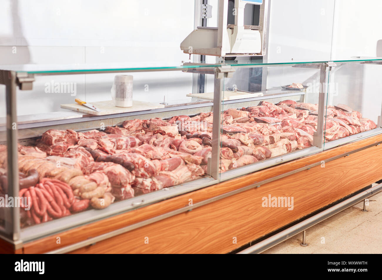 Rich offer of different types of meat in butchery in the supermarket ...