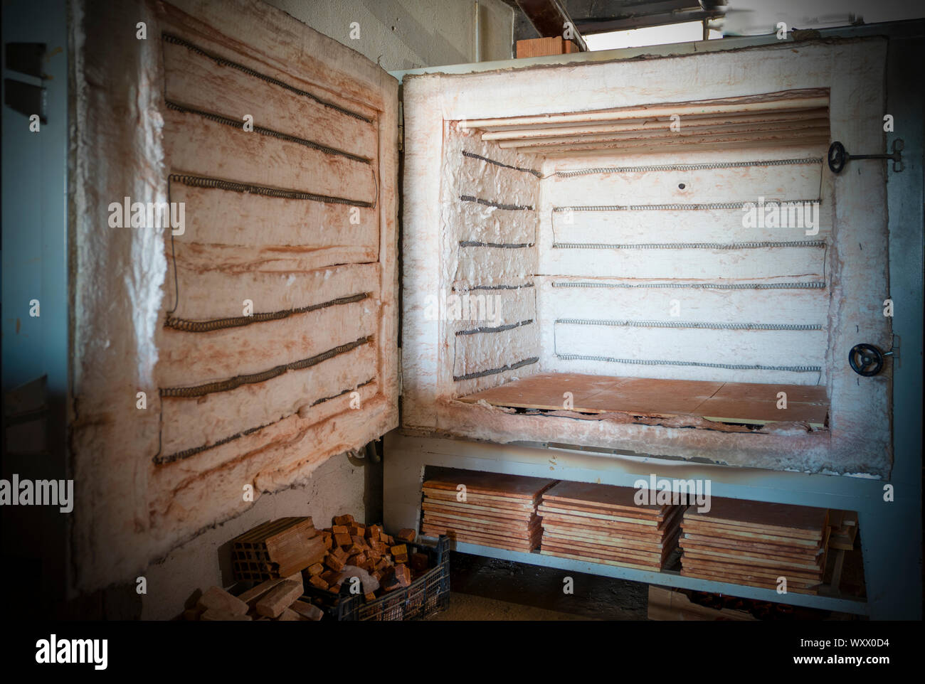 Electric oven for ceramic clay products. Front view of the empty