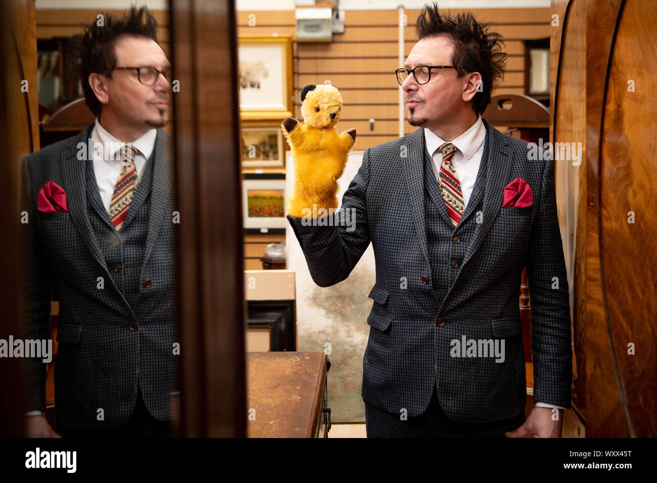 Senior Auctioneer Rik Alexander with an original Sooty TV puppet, which had been 'sitting in a box for 40 years' and could fetch over ??1000 when it goes up for auction at Hansons Auctioneers in Derbyshire on Thursday. Picture date: 18/09/19. Tina Stewart decided to sell the item after the owner of the Sooty Show, Richard Cadell, told her of its value after meeting with her and her six-year-old son Kyle after a live show. Mrs Stewart was given the TV prop by the original inventor of Sooty, Harry Corbett, who was a good friend of her father, retired biology teacher Paul Mouncey. See PA story SA Stock Photo