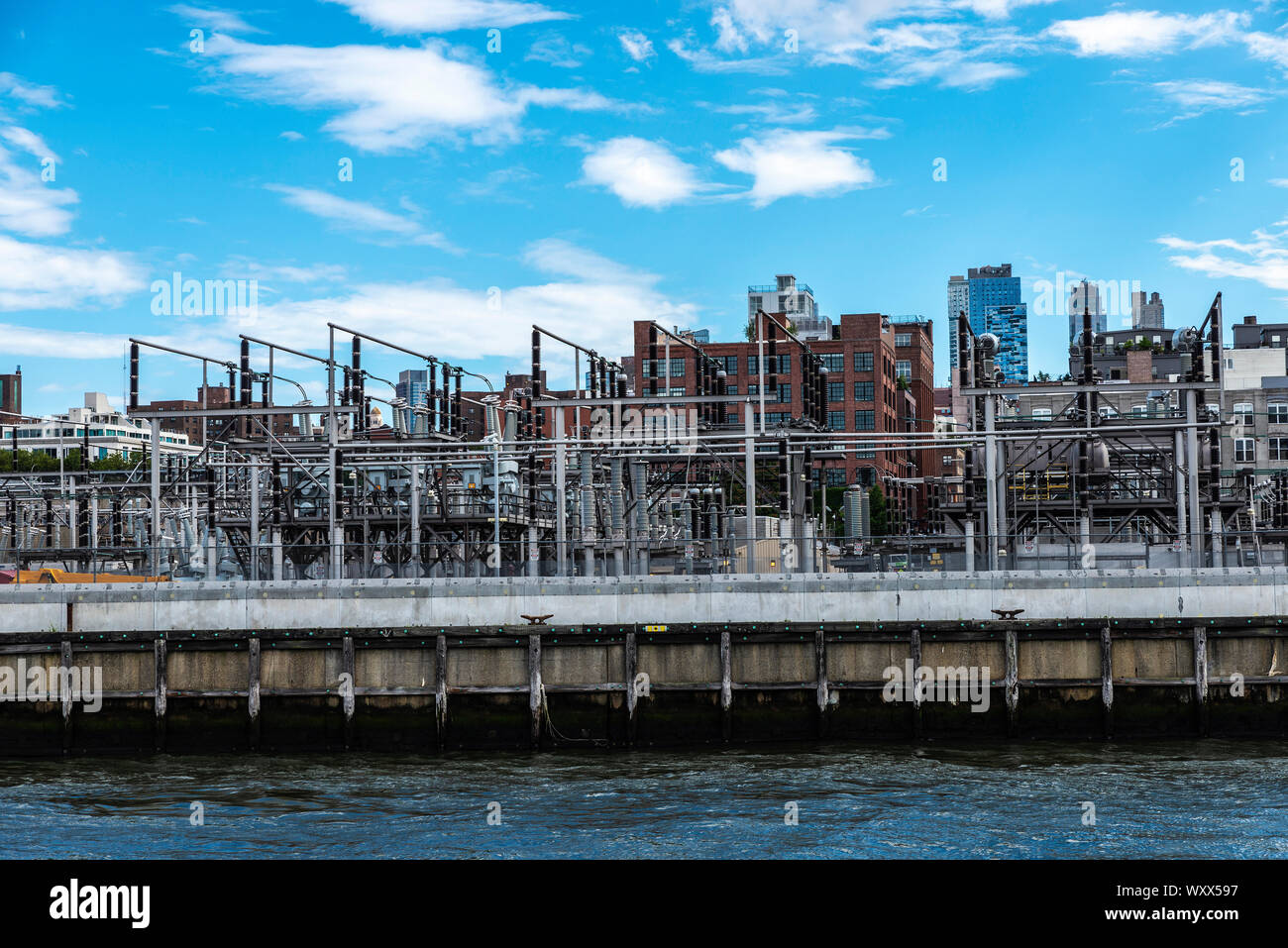 Electricity generation plant of Consolidated Edison, Inc., (Con Edison or Con Ed) on the East River at 15th Street in Manhattan, New York City, USA Stock Photo