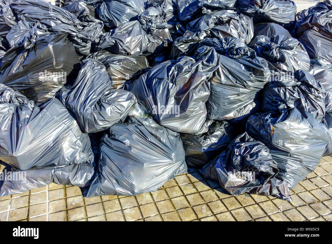 Pile of full plastic bags of garbage Stock Photo