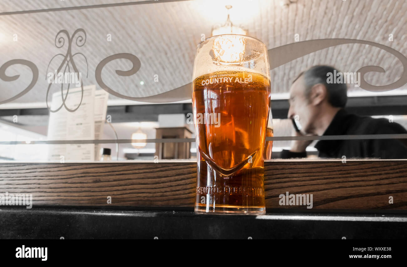 Pint of beer, craft ale in pub in England. UK Stock Photo