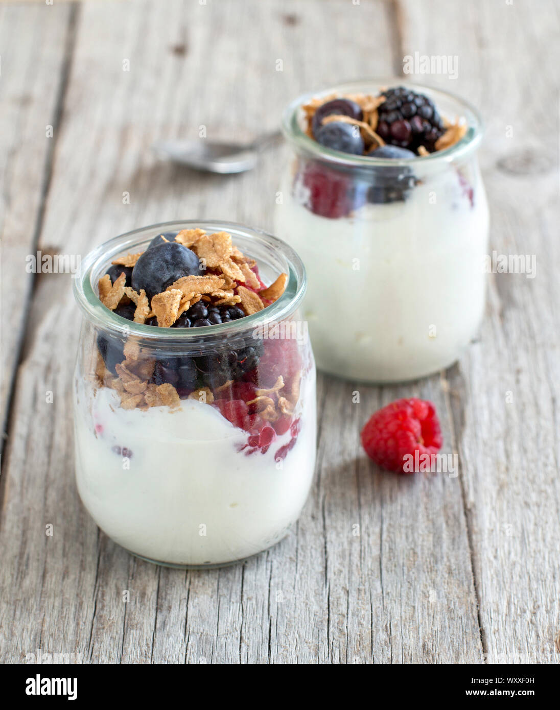 Healthy breakfast with Fresh greek yogurt, flakes and berries Stock