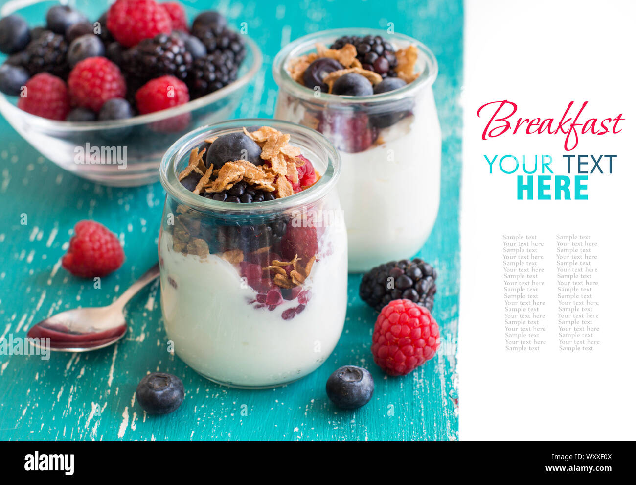 Berries, flakes and fresh greek yogurt in a jar Stock Photo - Alamy