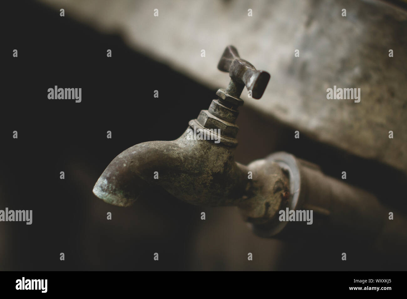 Old vintage brass tap on PVC pipe Stock Photo Alamy