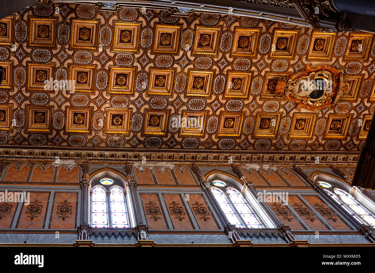 Basilica; Cathedral of the Assumption of Mary; intricate ceiling, ornate, colorful, 3 windows, Duomo; Cattedrale di San Gennaro; 14 century; Catholic; Stock Photo