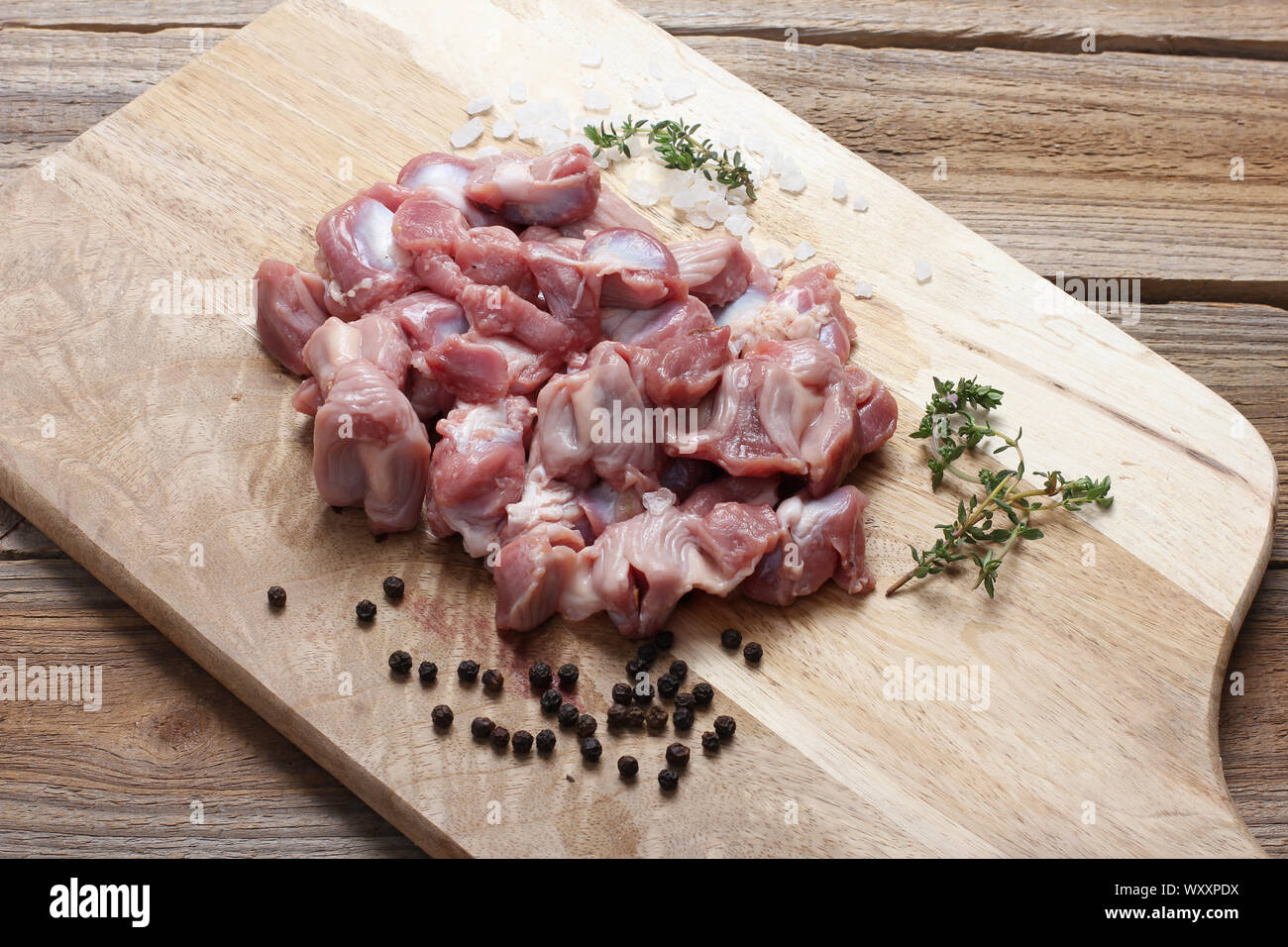 Chicken Giblets on Chopping Board Stock Photo Alamy