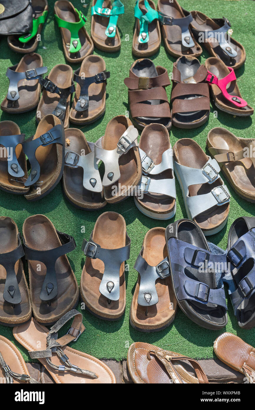 Many Second Hand Sandals at Flea Market Stock Photo - Alamy