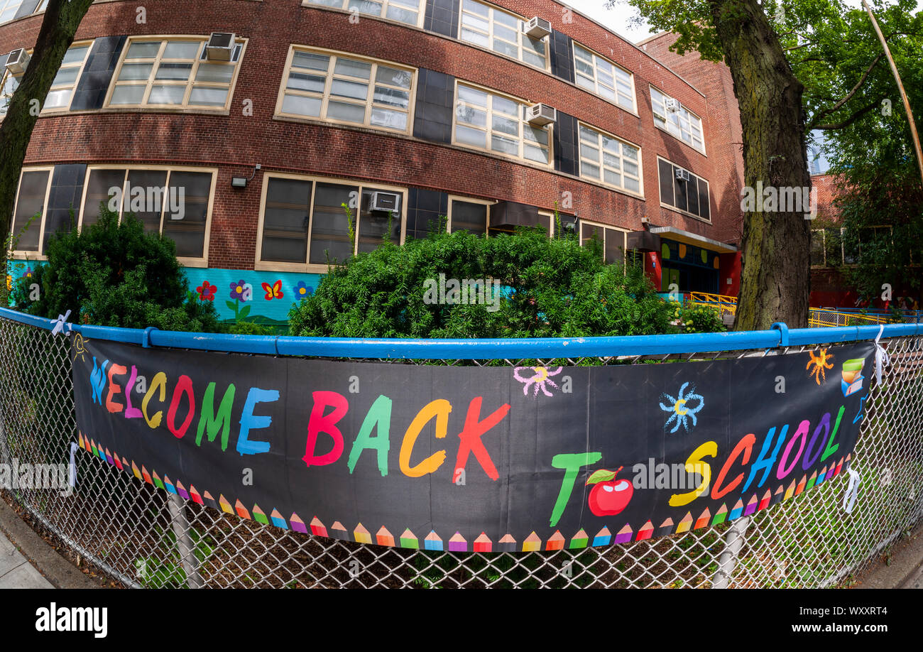 A “Welcome Back To School” banner greets students outside of PS33 in the Chelsea neighborhood of New York on the first day of school, Thursday, September 5, 2019. (© Richard B. Levine) Stock Photo