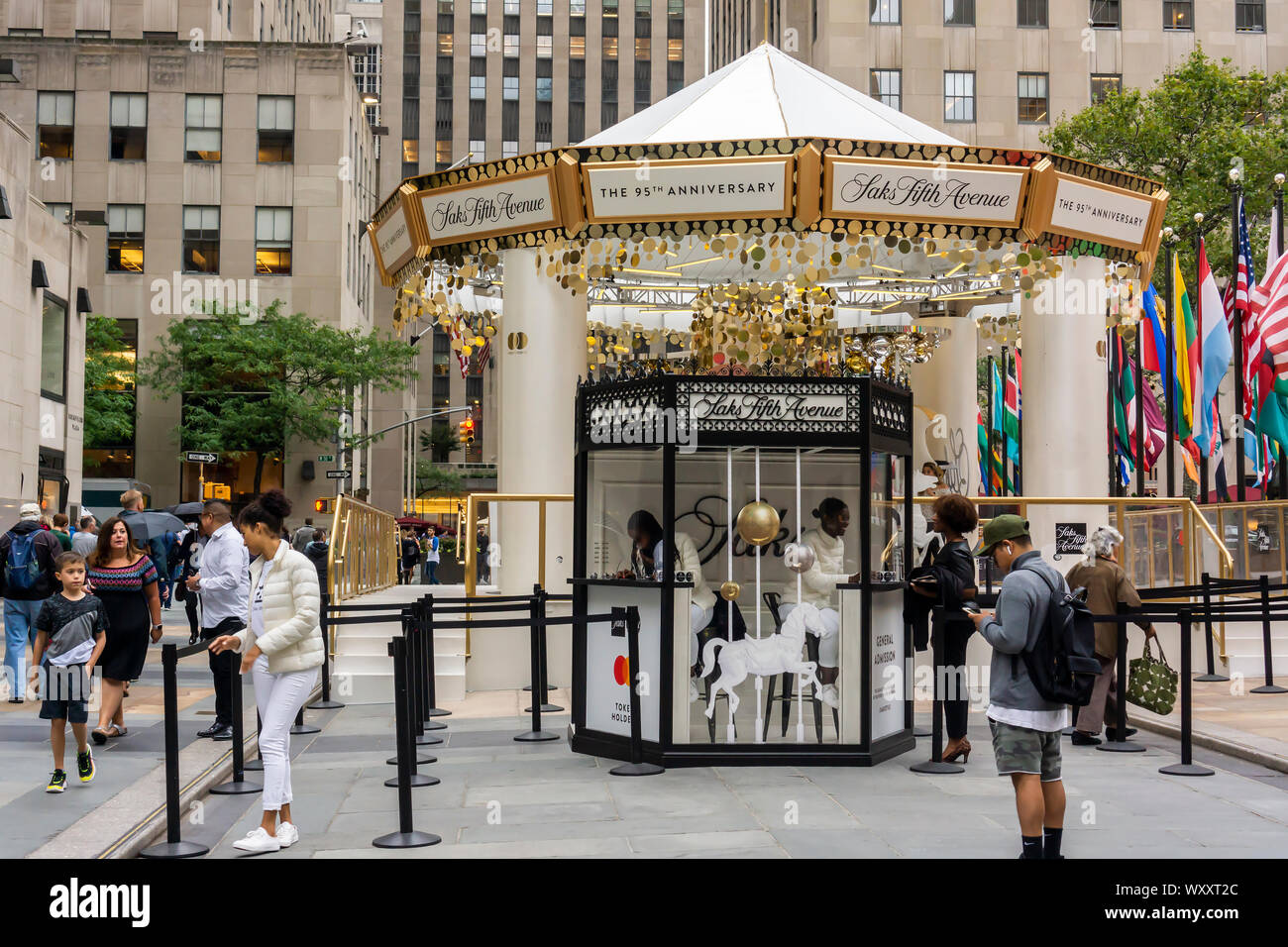 A Saks Fifth Avenue And Mastercard Branded Carousel Appears In Rockefeller Plaza Celebrating Saks 95th Anniversary Seen On Friday September 6 19 The Merry Go Round Features Seats Representative Of Products Sold In The