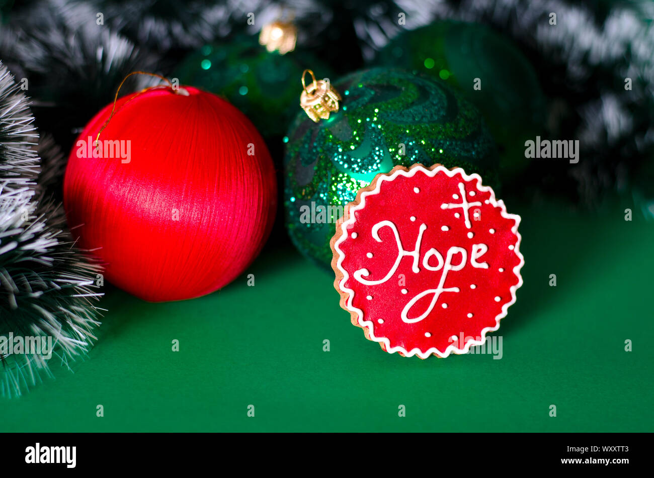 Christmas card: A red Christmas tree toy lies on a blue background Stock Photo - Alamy