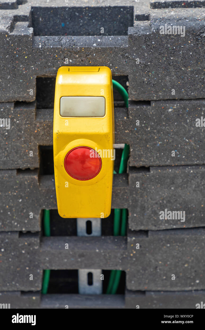 Big Red Bush Button for Temporary Traffic Light Stock Photo