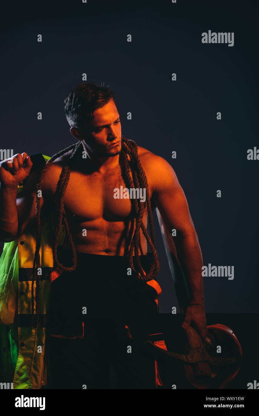 Mining area under construction. Muscular man worker. Hard worker with ...