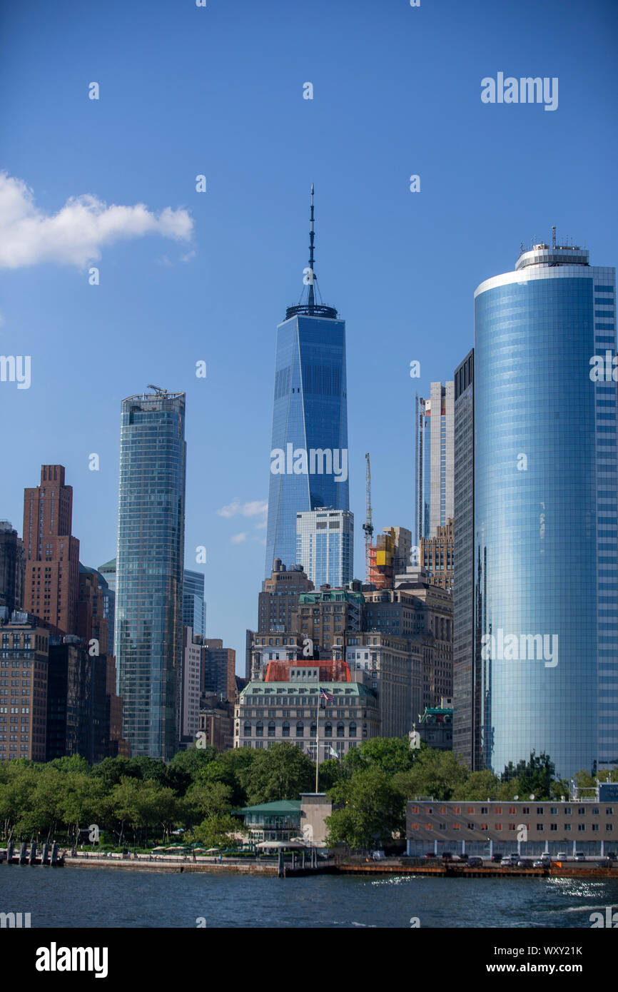 A view of lower Manhattan and One World Trade Center from the Staten Island Ferry in New York City. Stock Photo