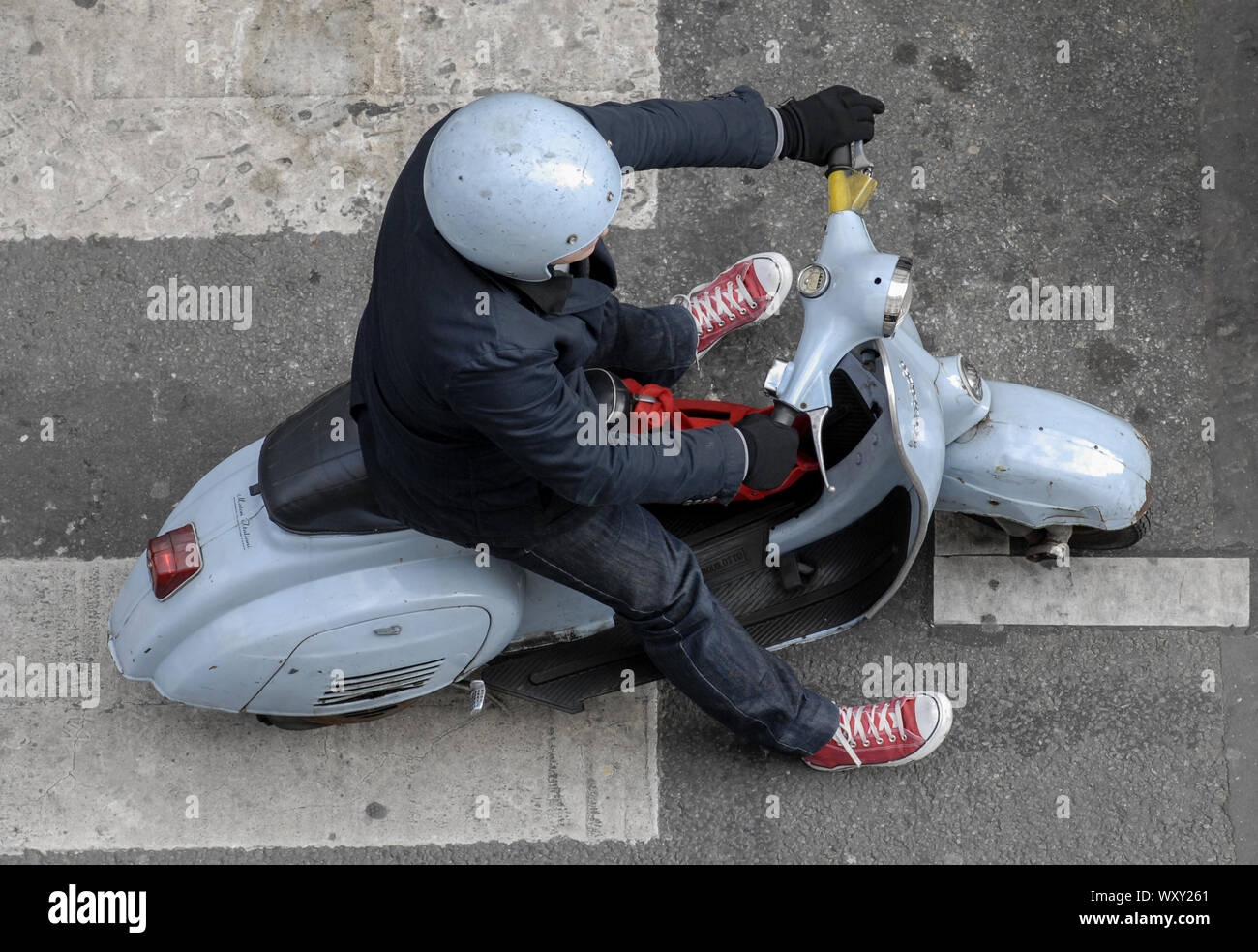 VINTAGE BLUE - SCOOTER - MAN ON SCOOTER - PARIS MAN - SCOOTER PARIS -  AERIAL VIEW OF A MAN ON A VINTAGE SCOOTER - VINTAGE SCOOTER -VINTAGE VESPA  SCOOTER - PARIS