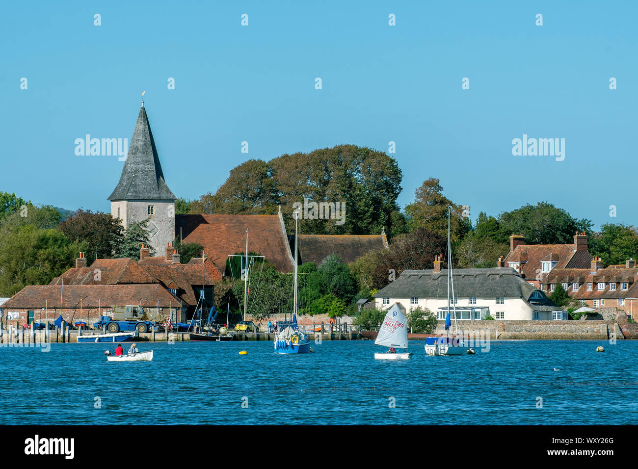 High Tide In The Picturesque Village Of Bosham Showing The Holy Trinity 