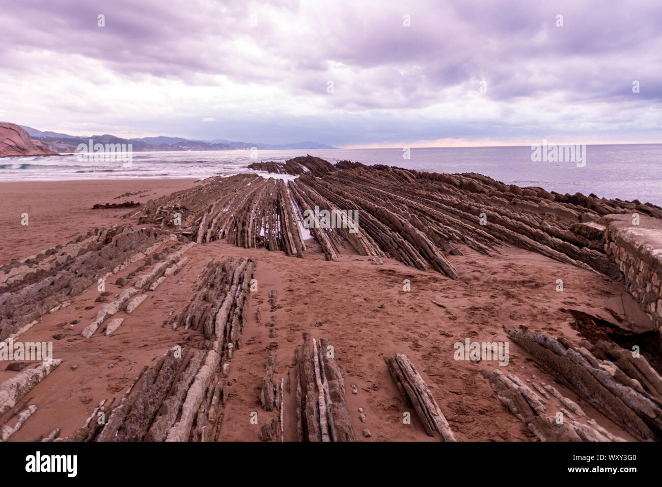 Flysch, Itzurun Beach, a sequence of sedimentary rock layers, Zumaia, Basque Country, Spain Stock Photo