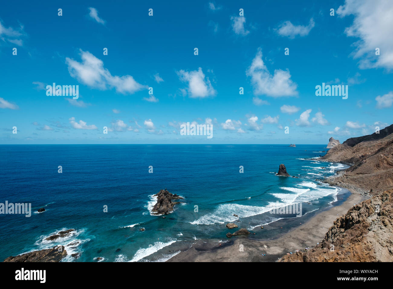 Rocks at coast and ocean horizon at Benijo Beach in Tenerife Stock Photo