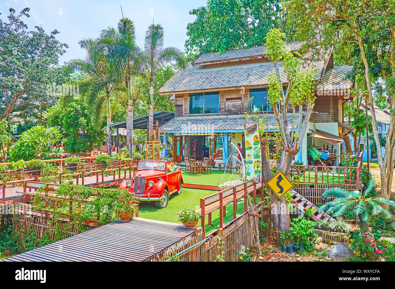 PAI, THAILAND - MAY 5, 2019: The countryside hotel-restaurant, surrounded by lush tropical carden and located in Pai suburb, next to Memorial bridge, Stock Photo