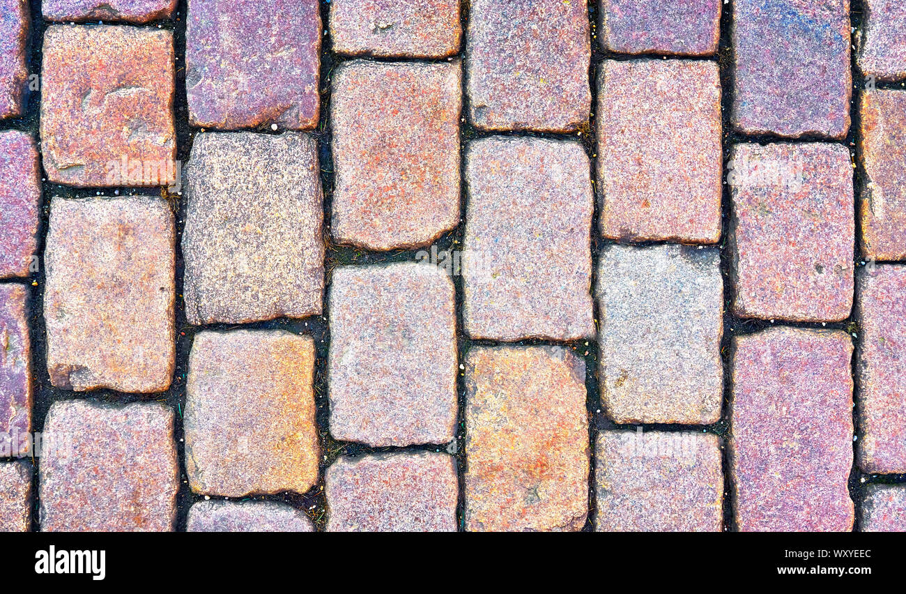 Cobblestone street as a stone background. Stock Photo