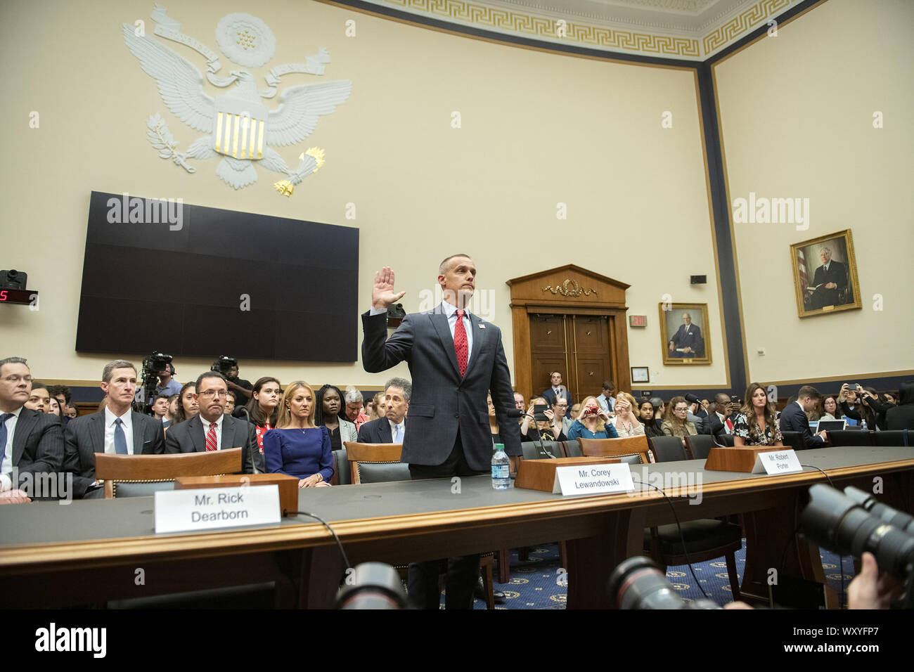 September 17, 2019, Washington, District of Columbia, USA: Former Trump campaign manager Corey Lewandowski is sworn-in to give testimony before the United States House Committee on the Judiciary as it conducts a hearing titled ''Presidential Obstruction of Justice and Abuse of Power'' on Capitol Hill in Washington, DC on Tuesday, September 17, 2019. The empty chair at left is reserved for Rick Dearborn, who refused to appear and the empty chair at right is reserved for Robert Porter, who also refused to appear. Credit: Ron Sachs/CNP.(RESTRICTION: NO New York or New Jersey Newspapers or new Stock Photo