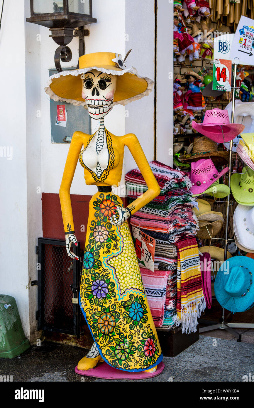 Day of the dead figure  at entrance to shop on the Malecon, Puerto Vallarta, Jalisco, Mexico. Stock Photo