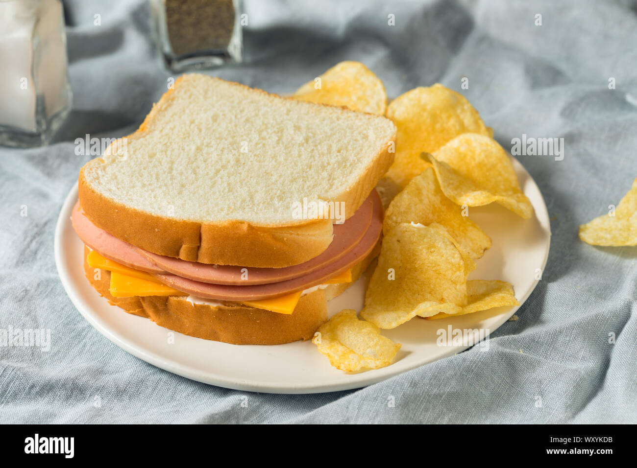 Homemade Bologna and Cheese Sandwich with Chips Stock Photo Alamy
