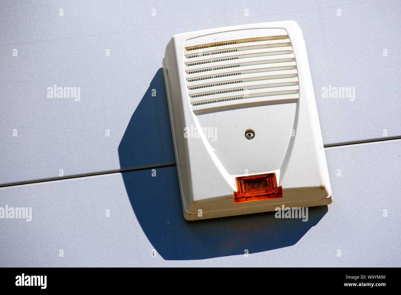 close up on a white security alarm box on a wall Stock Photo