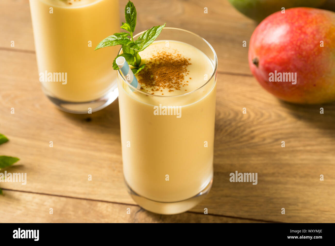 mango lassi high resolution stock photography and images alamy https www alamy com homemade sweet indian mango lassi smoothie with mint image274745478 html