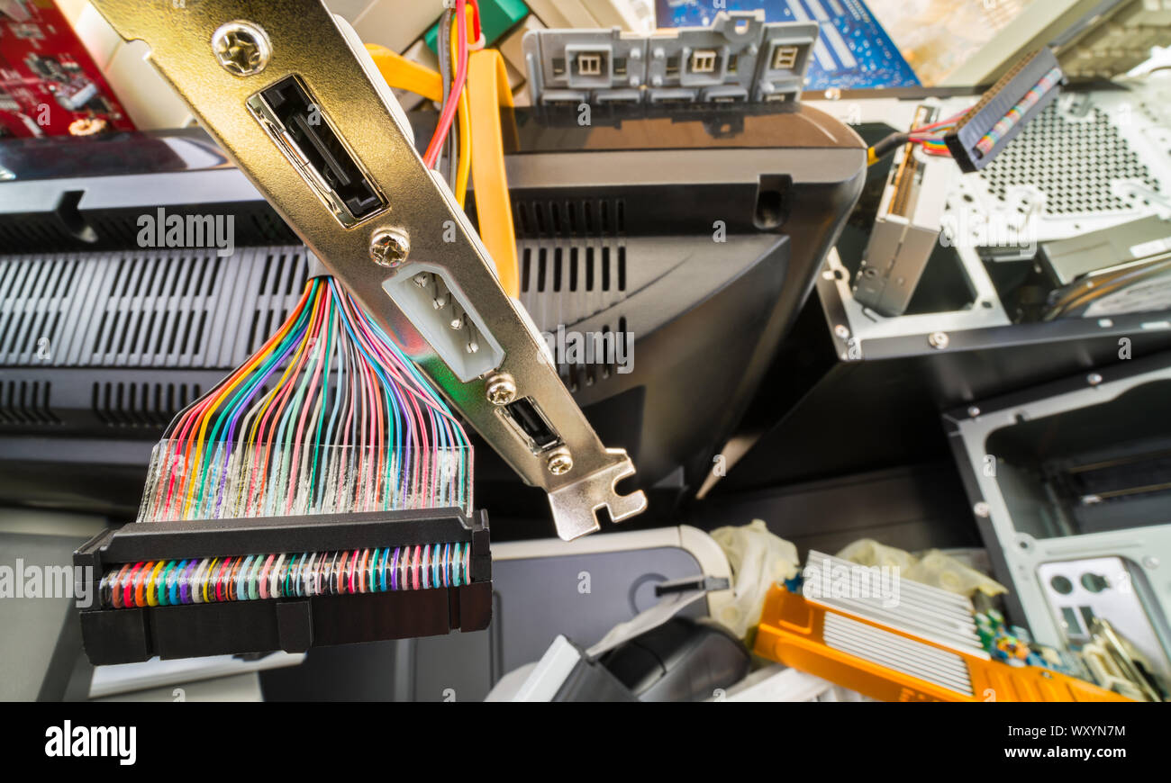Ewaste heap detail of used computer components. Colorful flat parallel