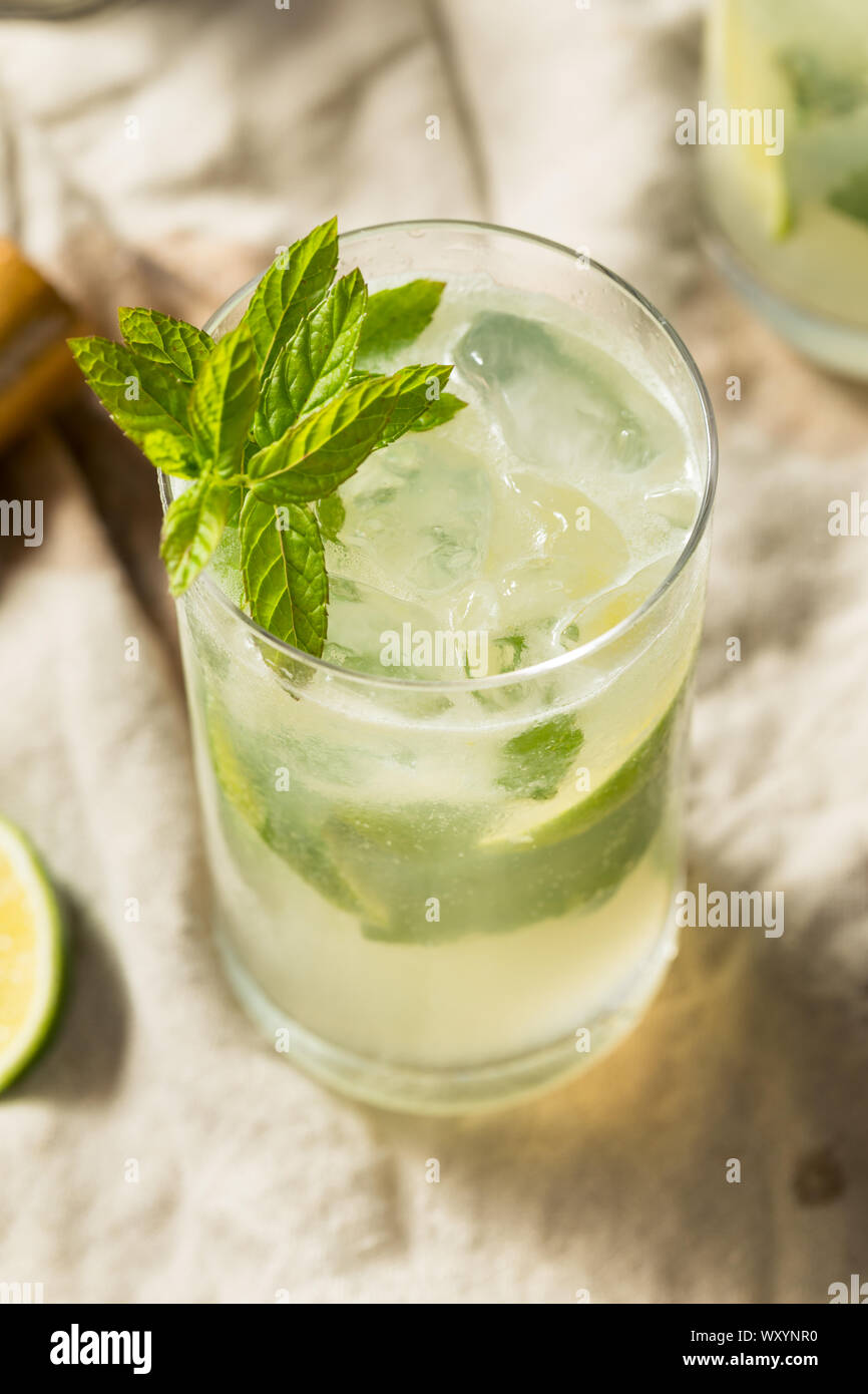 Sweet Mint Rum Mojito with Limes and Soda Water Stock Photo