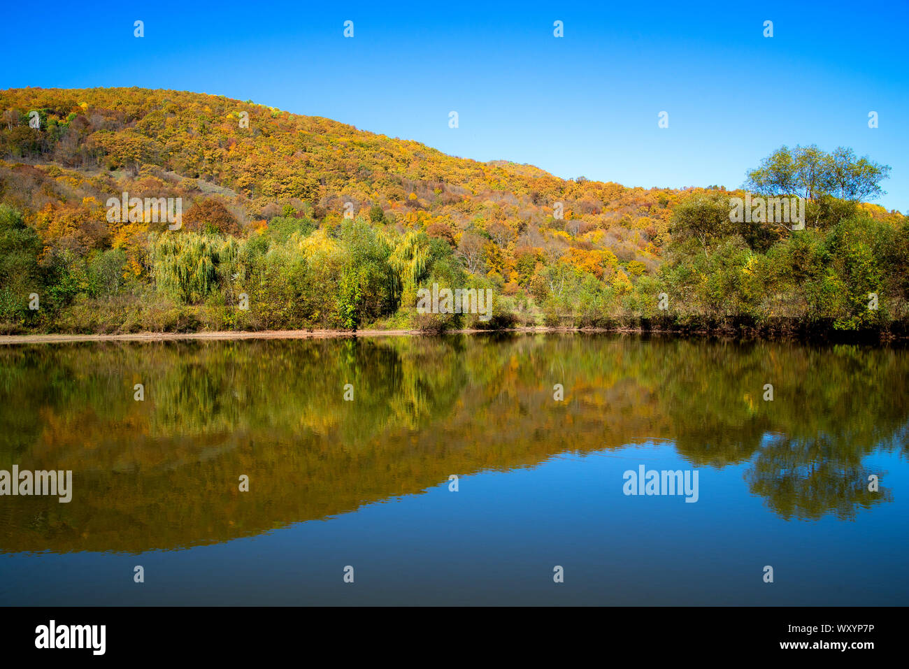 Mountain landscape, lake and mountain range. Summer in mountain region ...